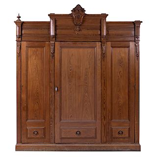 WARDROBE. PRINCIPLES OF XX CENTURY. Made of carved wood. With 3 doors, 4 interior drawers and plinth type supports.