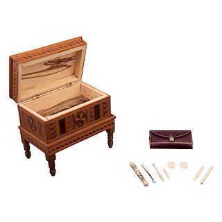 ARCHETTE AND MANICURE SET ORIENTAL ORIGIN, XX CENTURY In wood and ivory carving. Manicure set with wine-colored leather case.