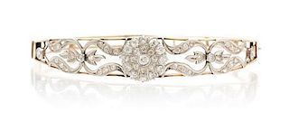 An Antique Platinum Topped Gold and Diamond Bangle, 11.40 dwts.