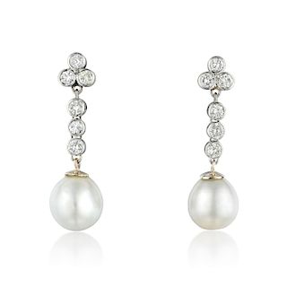 A Pair of Cultured Pearl and Diamond Drop Earrings