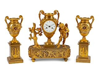 A Louis XVI Style Gilt-Bronze Three-Piece Clock GarnitureLate 19th Century