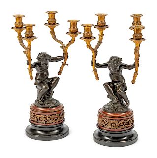 A Pair of French Parcel-Gilt and Patinated Bronze Four-Light Figural Candelabra