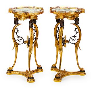 A Pair of Directoire Style Parcel-Gilt and Patinated Bronze Gueridons