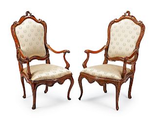 A Pair of Venetian Rococo Carved Walnut Armchairs