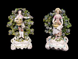 A Large Pair of Chelsea Porcelain Figural Candlesticks