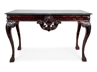 A George II Style Carved and Ebonized Console