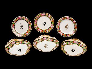 Seven Chinese Export Armorial Porcelain Plates