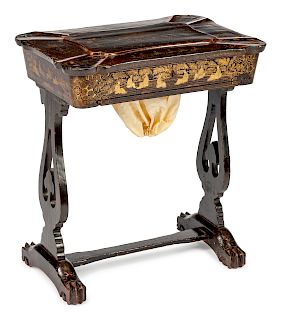 A Chinese Export Gilt-Decorated Black Lacquer Sewing Table