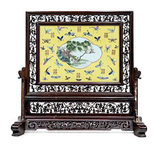 A Chinese Porcelain and Rosewood Table Screen