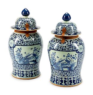 A Pair of Chinese Wrought-Iron-Mounted Blue and White Porcelain Tea Jars