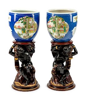 A Pair of Chinese Porcelain Jardinieres on Venetian Figural Pedestals