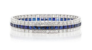 An Art Deco Platinum, Diamond and Synthetic Sapphire Bracelet, 23.10 dwts.