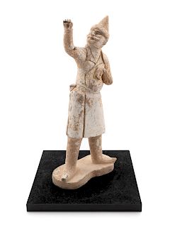 A Pottery Figure of a Groom
Height 15 1/2 in., 39 cm.