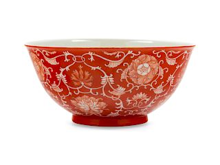A Reverse-Decorated Coral-Ground Porcelain Bowl
Diam 6 1/4 in., 16 cm. 