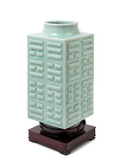 A Celadon Glazed Porcelain Cong Vase
Height 10 3/4 in., 27 cm. 