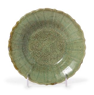 A Celadon Crackled Glazed Porcelain Floriform Dish
Diam 7 1/2 in., 19 cm. 