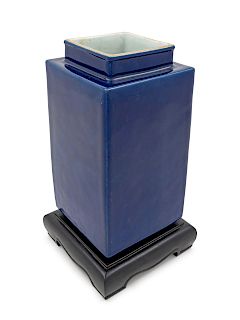 A Blue Glazed Porcelain Square Vase
Height 9 3/4 in., 25 cm. 