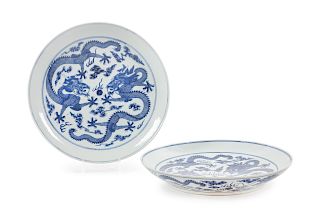 A Pair of Blue and White Porcelain 'Dragon' Plates
Diam 15 1/8 in., 38 cm.
