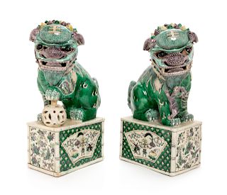 A Pair of Famille Verte Porcelain Figures of Fu Lions
Height 12 in., 31 cm. 