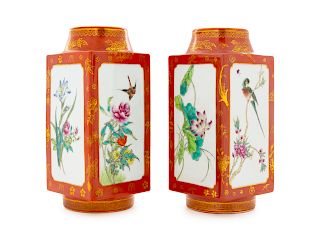 A Pair of Gilt Decorated Coral-Ground Famille Rose Porcelain Cong Vases
Height 10 in., 25 cm. 