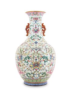 A Famille Rose Porcelain Double Handled Vase
Height 12 in., 30 cm. 