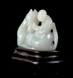 A Pale Grey Jade 
Horse and Groom
 Group
Length 2 3/8 in., 6 cm. 