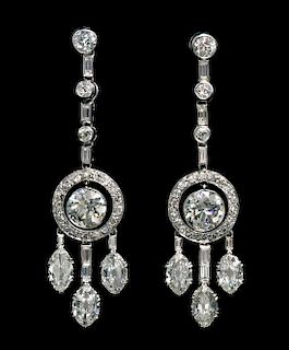 A Pair of Art Deco Platinum and Diamond Dangle Earrings, 7.80 dwts.