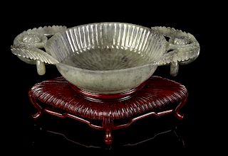 A Mughal-Style Grey and White Jade 'Chrysanthemum' Bowl
 Length 9 in., 23 cm. 