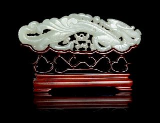 A Large White Jade 'Dragon' Plaque
Width 7 in., 18 cm. 
