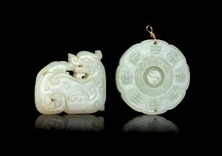 Two Celadon Jade Pendants
Larger: diam 2 1/4 in., 6 cm. 