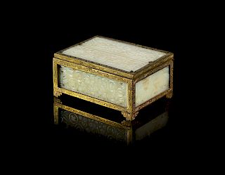 A Brass Mounted Jade Plaque Inset Jewelry Box
Length 3 3/4 x height 1 3/4 x width 2 3/4 in., 10 x 4 x 7 cm. 
