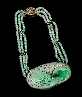 A Jadeite Beaded Necklace
Length 9 in., 23 cm. 