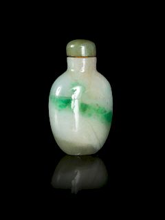 An Apple Green and Celadon Jadeite Snuff Bottle
Height 2 in., 5 cm. 