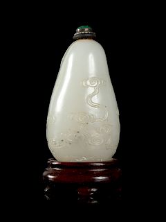 A White Jade Snuff Bottle
Height 2 1.2 in., 6 cm. 
