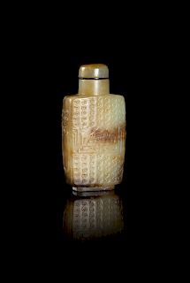 A Russet and Celadon Jade 'Kuilong' Snuff Bottle
Height 2 1/2 in., 6 cm. 