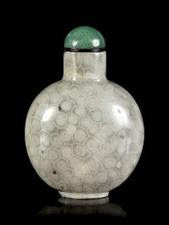 A Fossilized Coral Snuff Bottle
Height 2 3/4 in., 7 cm.