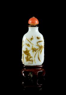 A Yellowish-Brown Overlay White Peking Glass Snuff Bottle
Height 2 1/4 in., 6 cm. 