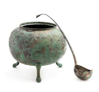 A Large and Rare Bronze Tripod Tureen and Ladle
Ladle: length 13 1/4 in., 34 cm., Tureen: height 8 1/2 x diam 9 in., 22 x 23 cm. 