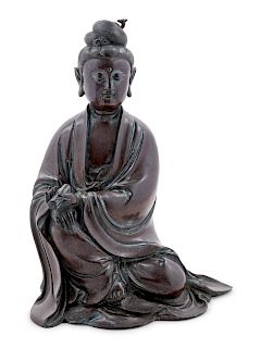 A Silver Inlaid Bronze Figure of Guanyin
Height 12 1/2 in., 32 cm. 