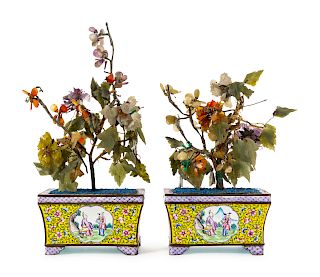 A Pair of Canton Enamel on Copper Cachepot and Plants
Overall: height 12 in., 30 cm. 