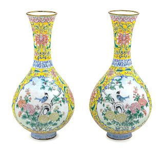 A Pair of Canton Painted Enamel Vases
Height 17 1/2 in., 45 cm. 