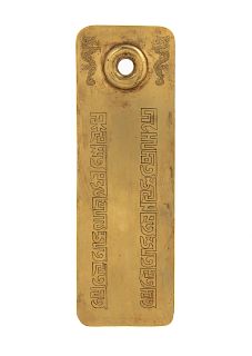 A Gilt Bronze Plaque
Length 8 1/4 x width 3 in., 21 x 7 cm. 