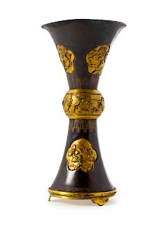 A Gilt Bronze Gu-Vase
Height 6 1/8 in., 16 cm. 