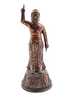 A Gilt Bronze Figure of Buddha
Height 10 1/4 in., 26 cm. 