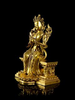 A Sino-Tibetan Gilt Bronze Figure of Maitreya Bodhisattva
Height 8 7/8 in., 23 cm. 