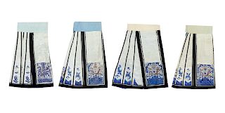 Four Embroidered Silk Apron Skirts
Average: 36 3/4 height in., 93 cm.