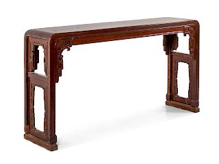 A Tieli Wood Corner-Leg Altar Table
Height 35 x length 14 1/4 x width 66 in., 89 x 36 x 168 cm.