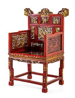A Gilt and Red Lacquered Wood Chair
Height 45 3/4 in., 111 cm.
