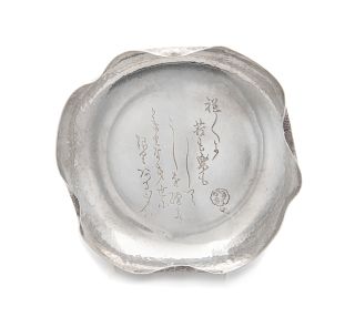 A Japanese Silver Flori-Form Plate
 Length 7 1/2 in., 19 cm., weight 8.0 dwts.