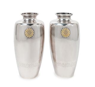 A Pair of Japaneses Sterling Vases
Each: height 12 in., 30 cm.